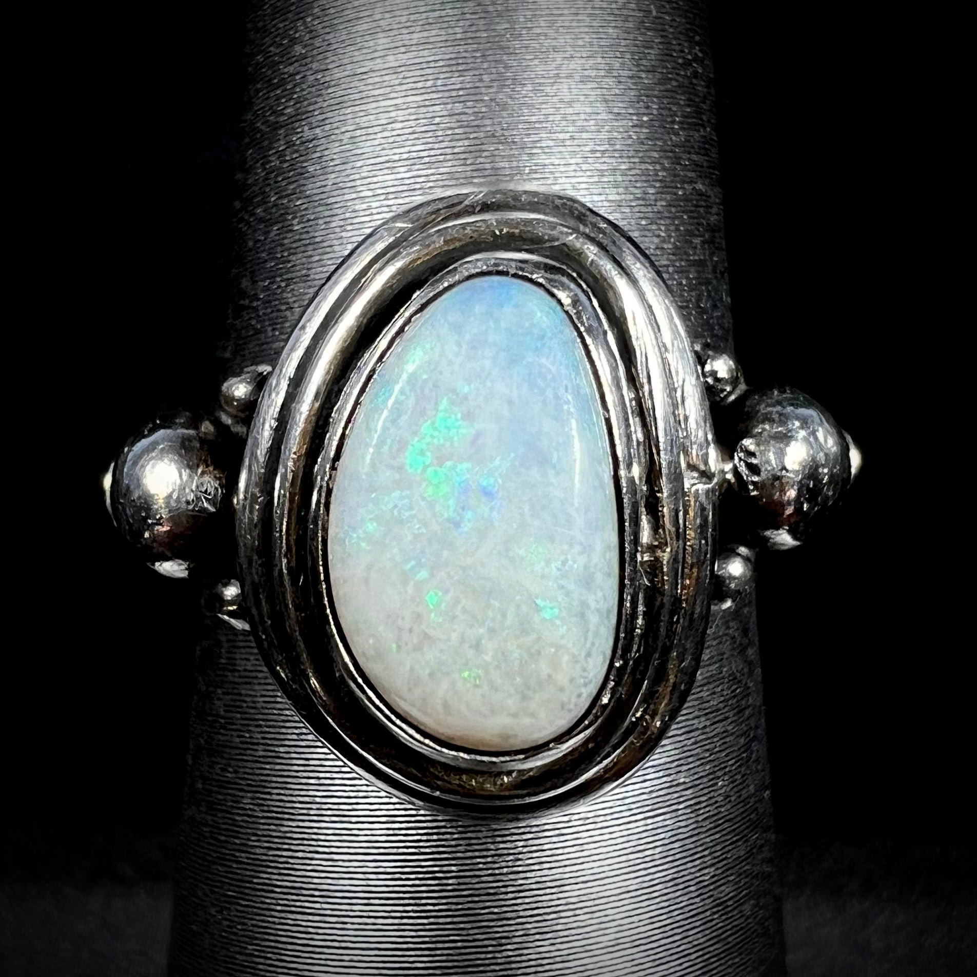 A handmade Boho-style sterling silver opal ring set with an Australian opal shown from the front.