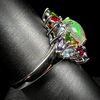 A silver Ethiopian opal gemstone ring made by D'Joy, shown from the side focusing on the shank.