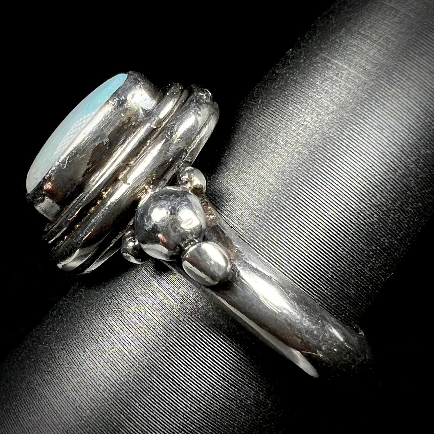 Side view of a sterling silver Boho-style ring.