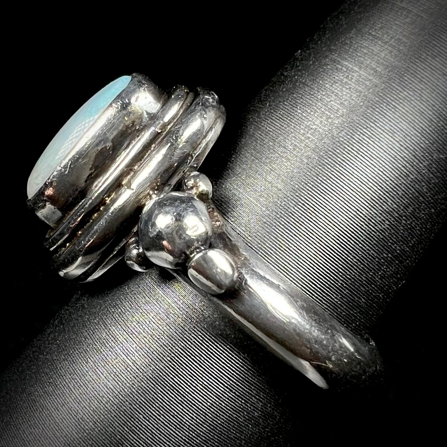 Side view of a sterling silver Boho-style ring.