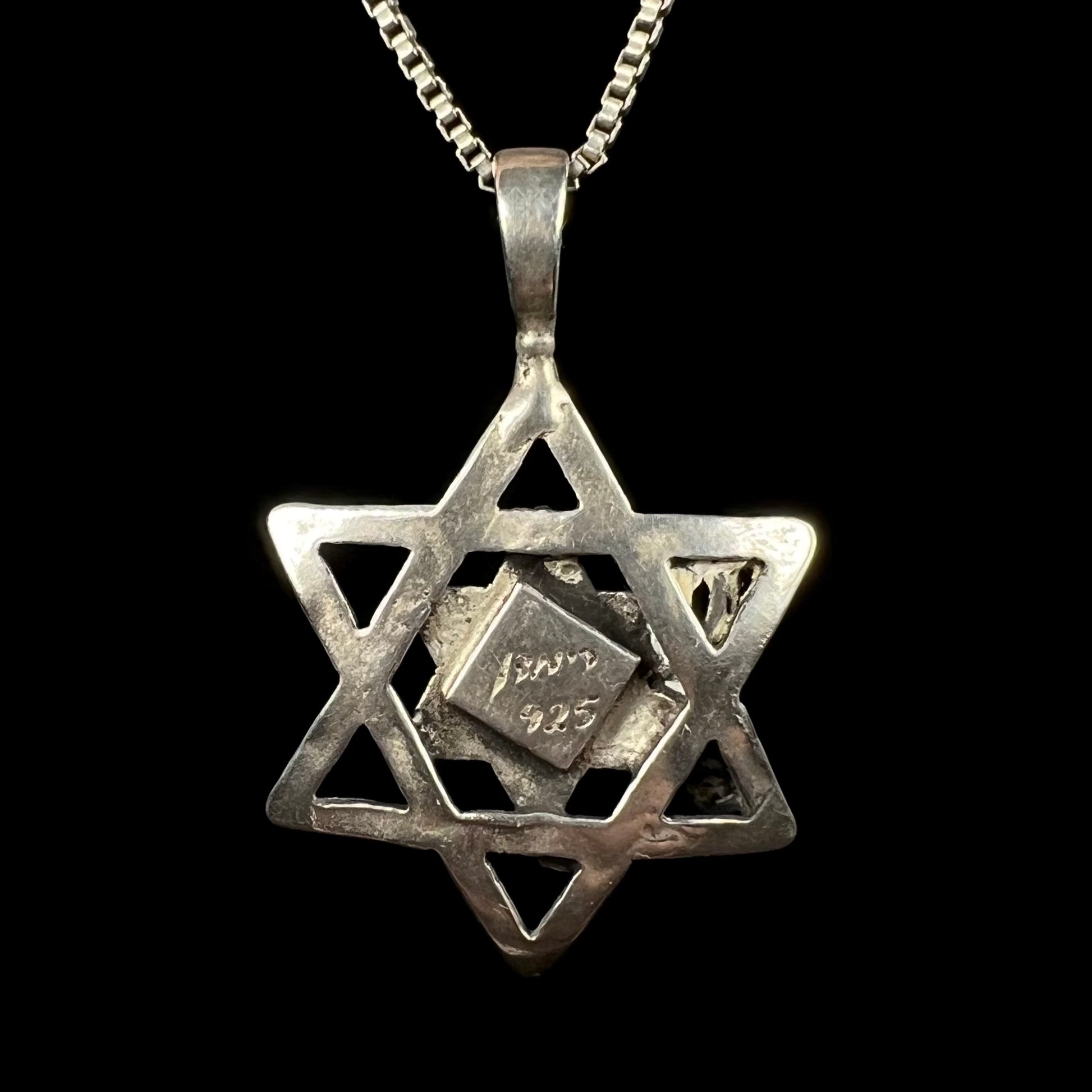 The back view of a sterling silver Star of David necklace made in Israel.
