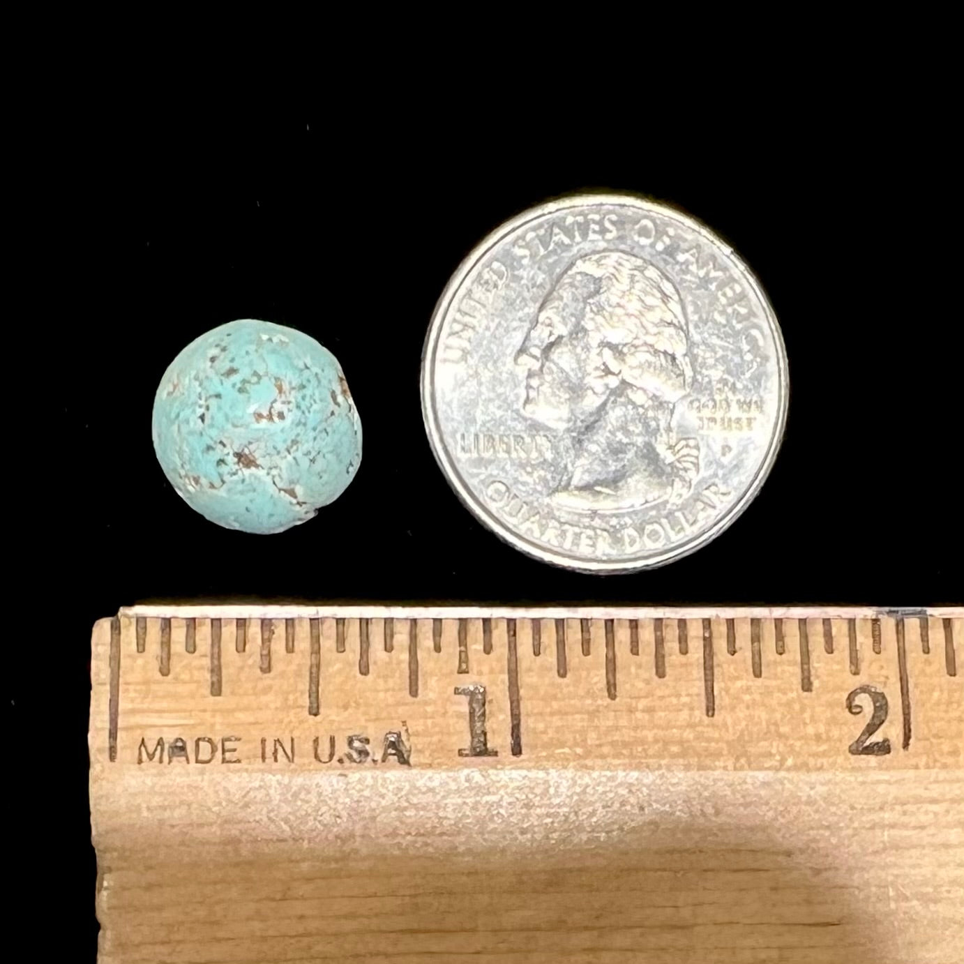 A round cabochon cut Sleeping Beauty turquoise stone from Arizona.