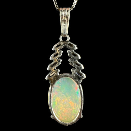 Back side of sterling silver Ethiopian opal drop pendant; "925" hallmark stamp seen on clip-on bail