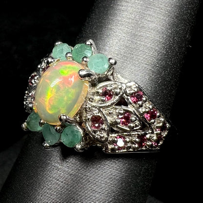 Sterling silver Ethiopian opal and rhodolite garnet-accented ring with green beryl embellishments on ring display