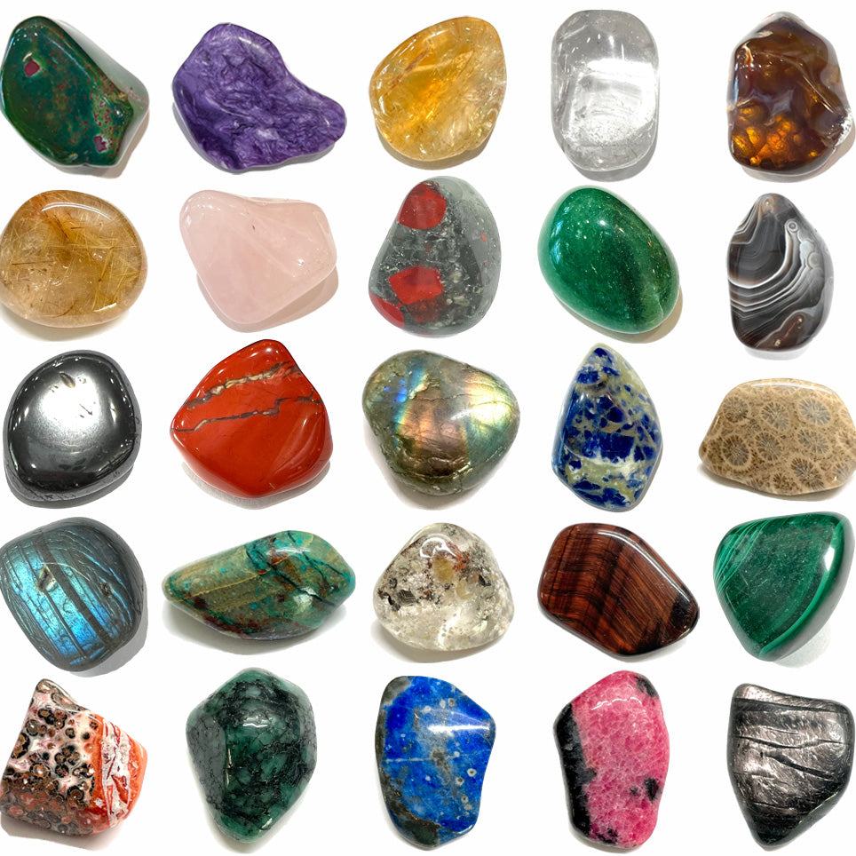 A lineup of different tumble polished stones.