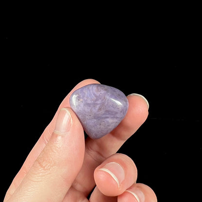 A tumble polished piece of purple turkiyenite jade stone.  Material from Bursa, Turkey.