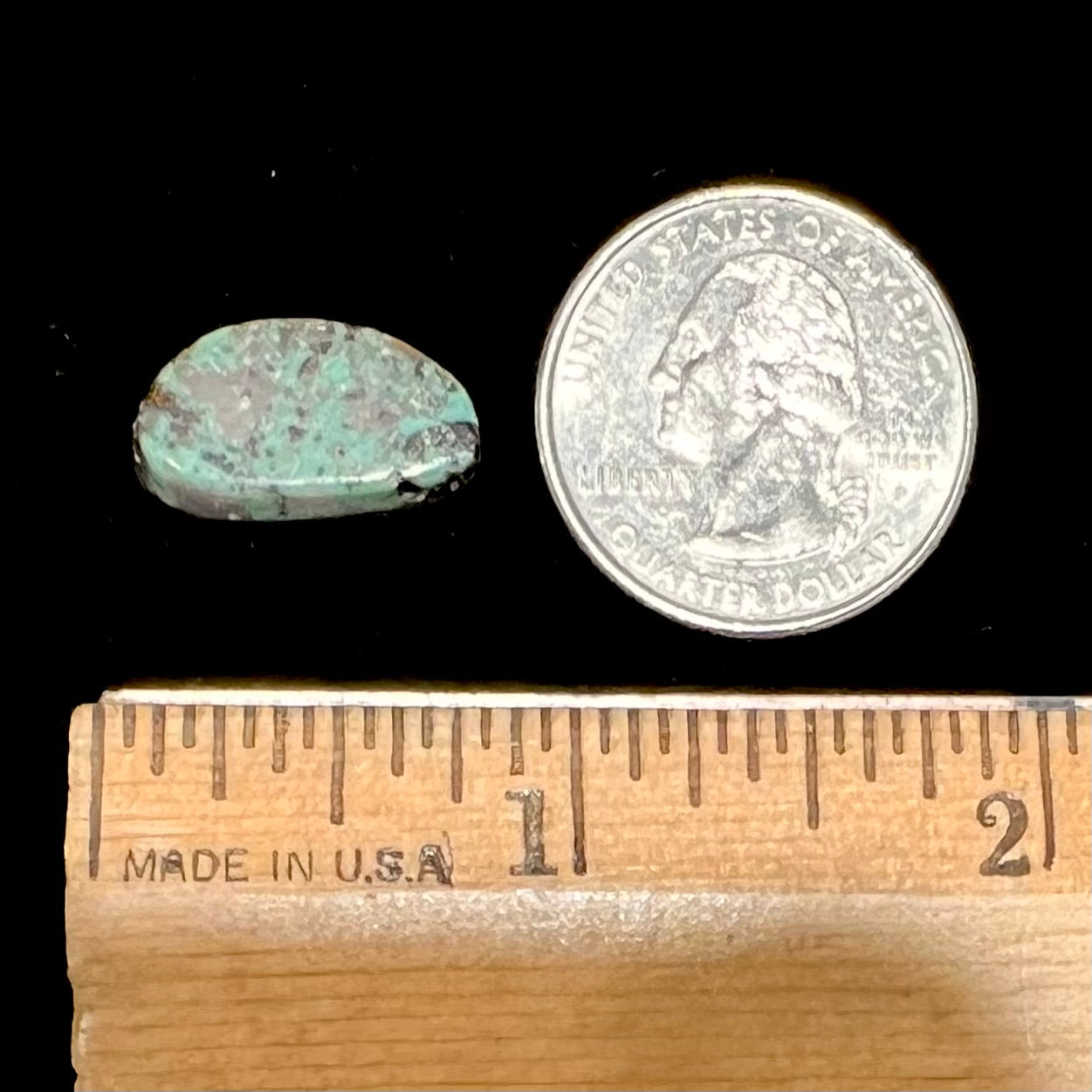 A freeform cabochon cut Valley Blue turquoise stone from Lander County, Nevada.