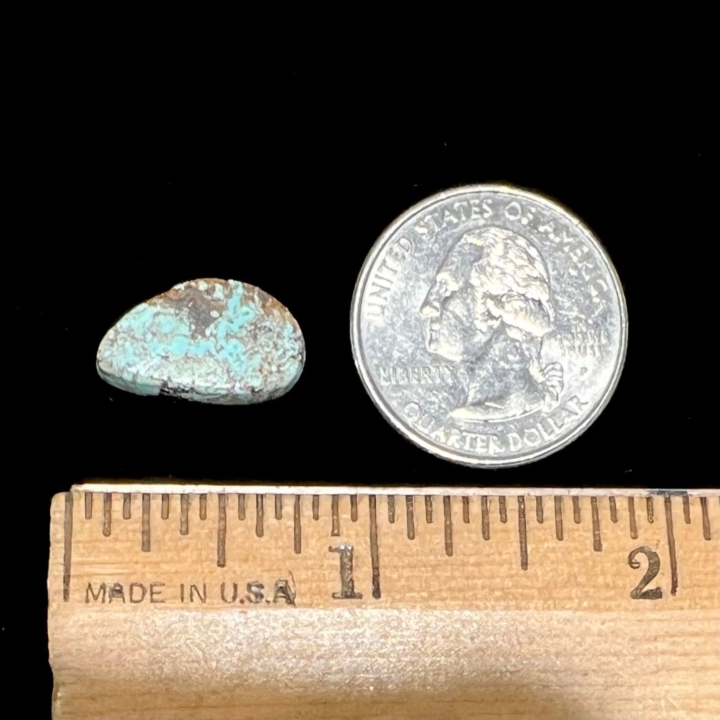 A loose, freeform cabochon cut Valley Blue turquoise stone from Lander County, Nevada.