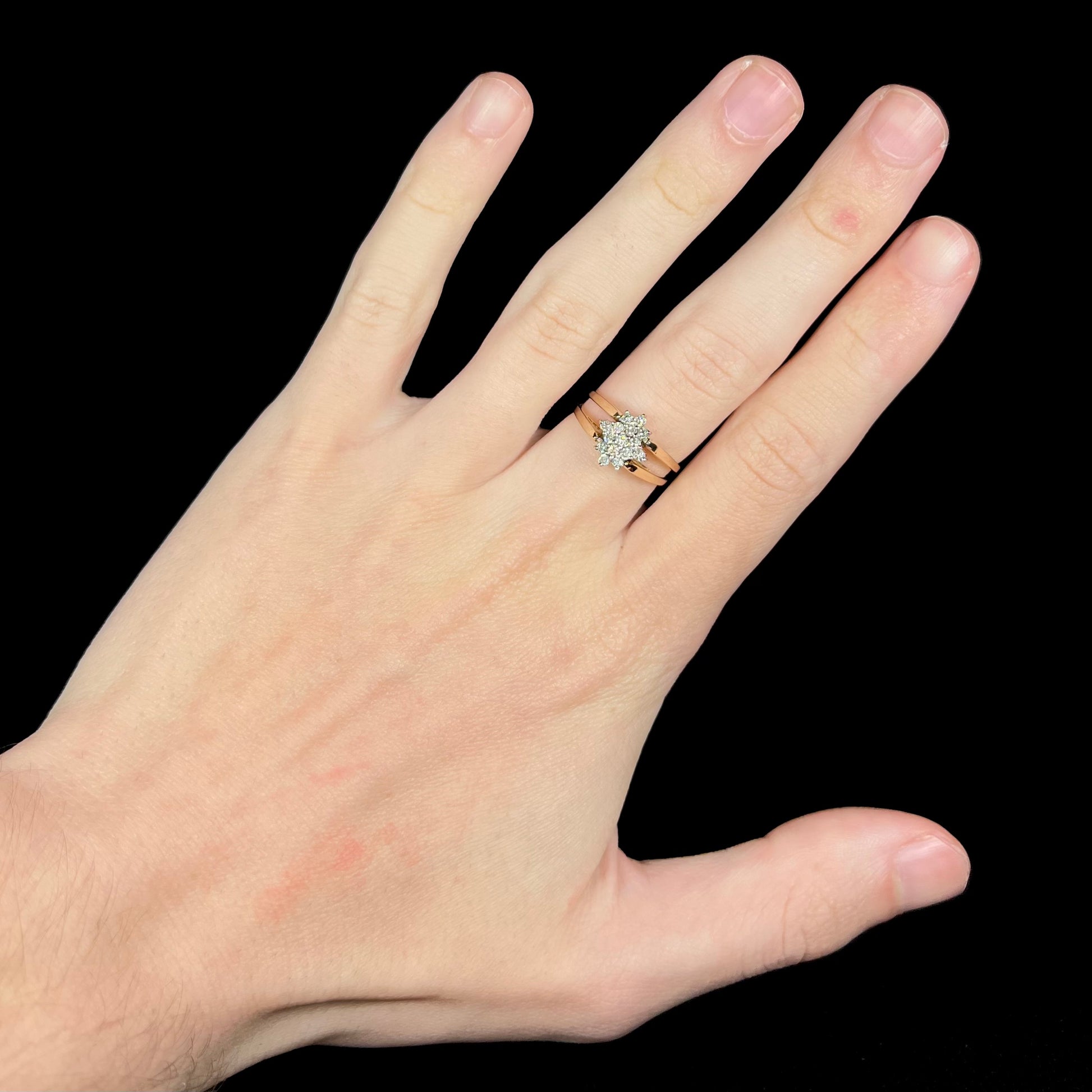 Vintage 1980s era 14k gold diamond cluster ring worn on hand